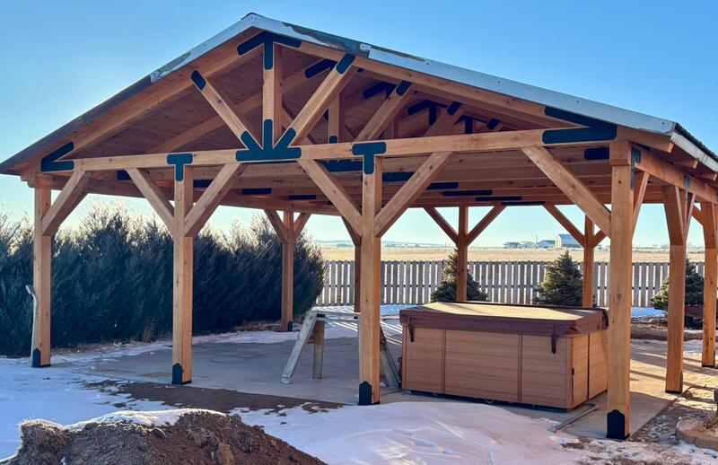 Heavy timber pavilion with assembled trusses and metal roof