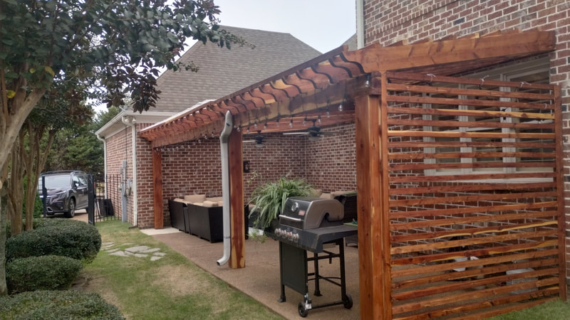 Stained heavy timber freestanding pergola with deep rafter shadows